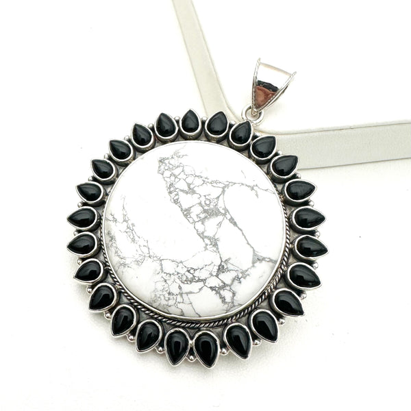 BLACK ONYX WHITE HOWLITE RISING SUN PENDANT (MW13)