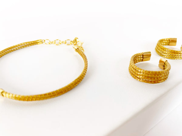 GOLDEN GRASS BRACELET AND RINGS SET